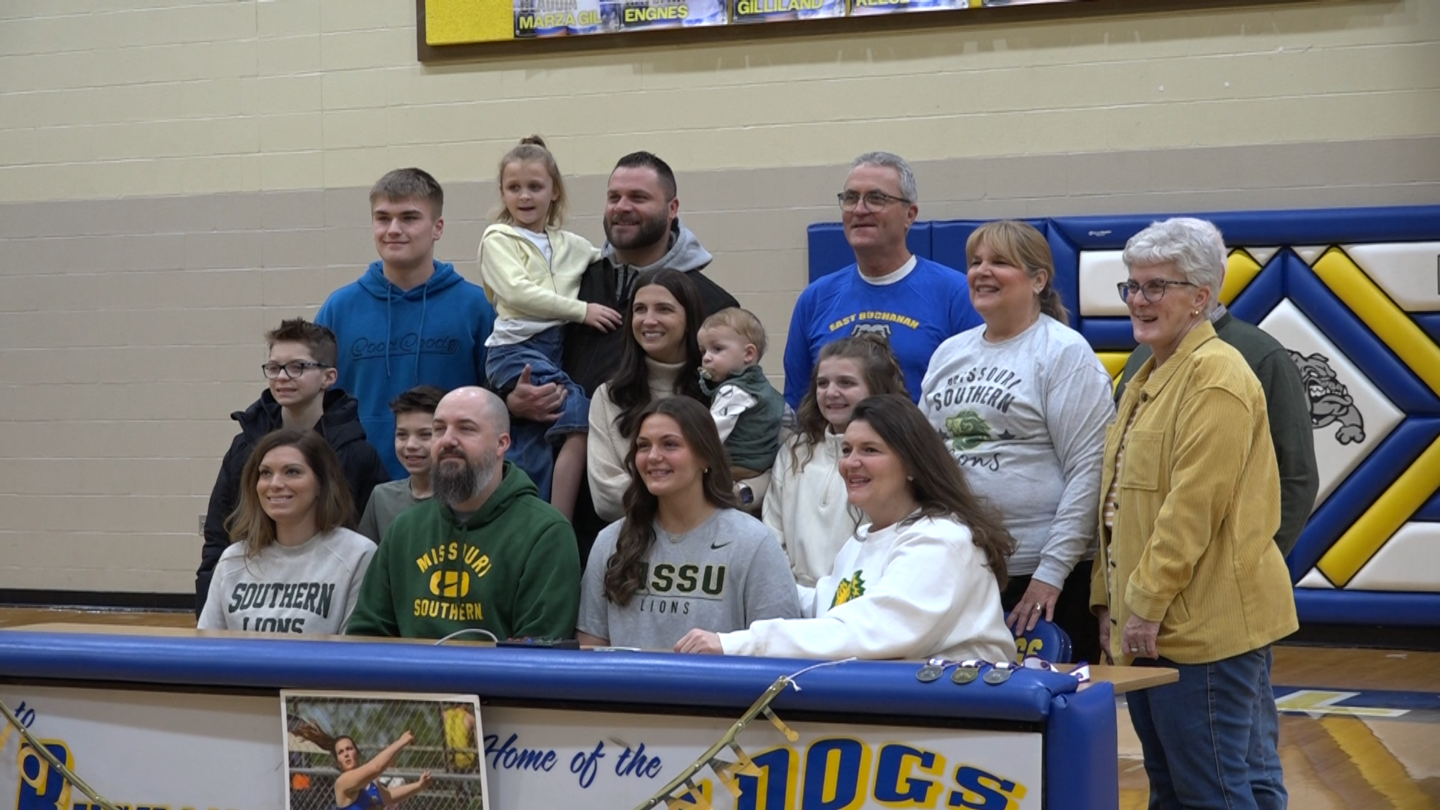 East Buchanan Senior, Brooklynn Johnson, poses for a photo with her family and coaches as she signs her letter of intent to continue her Track and Field career with the University of Southern Missouri. 