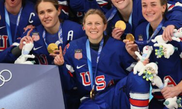 Kendall Coyne Schofield celebrates after winning gold