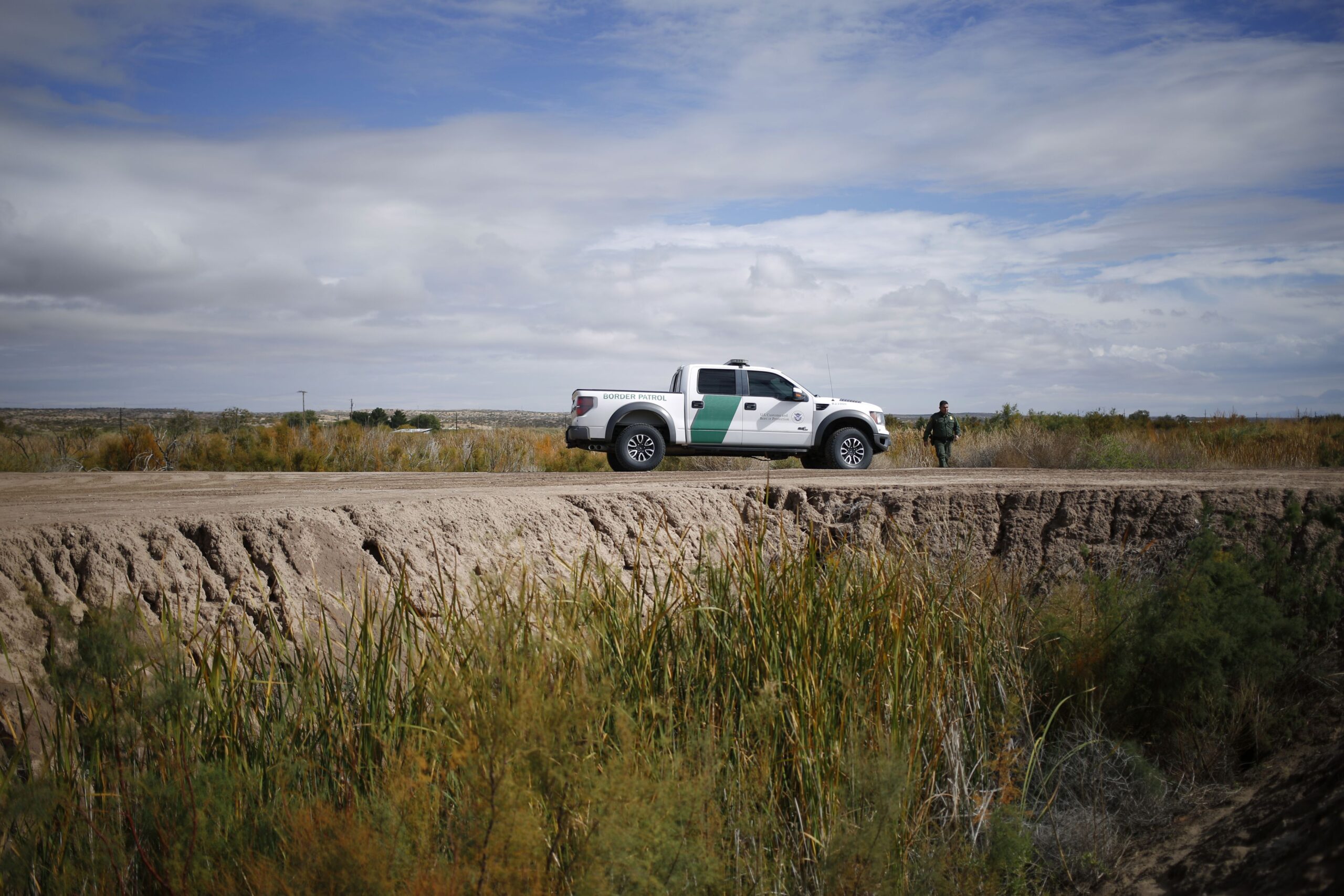 <i>Luke Sharrett/Bloomberg/Getty Images via CNN Newsource</i><br/>A Border Patrol agent searches an area near the southern border of the United States in Fort Hancock
