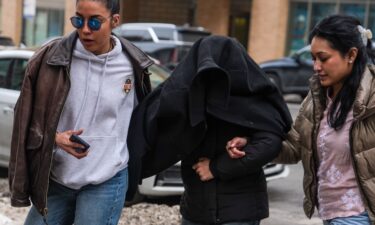 Protestors hold an anti-ICE rally outside Columbia University after federal agents detained a student Thursday.
