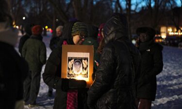 Activists gather Thursday in the Elmwood Village neighborhood of Buffalo