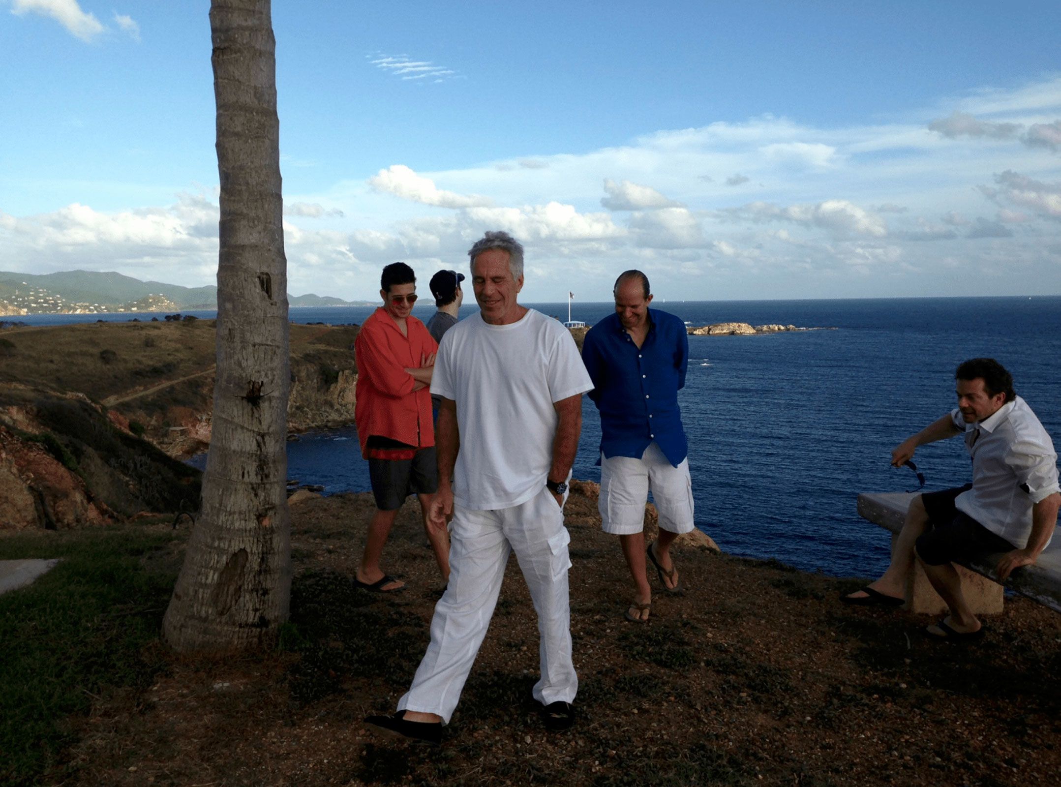 <i>Department of Justice via CNN Newsource</i><br/>This photo released by the Department of Justice appears to show Howard Lutnick (blue shirt) with Jeffrey Epstein on his private island in the Caribbean.