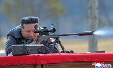 North Korea's official KCNA news agency shows North Korean leader Kim Jong Un firing a new sniper rifle