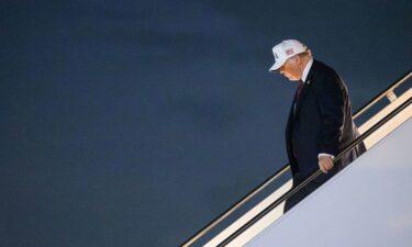 US President Donald Trump steps off Air Force One in West Palm Beach
