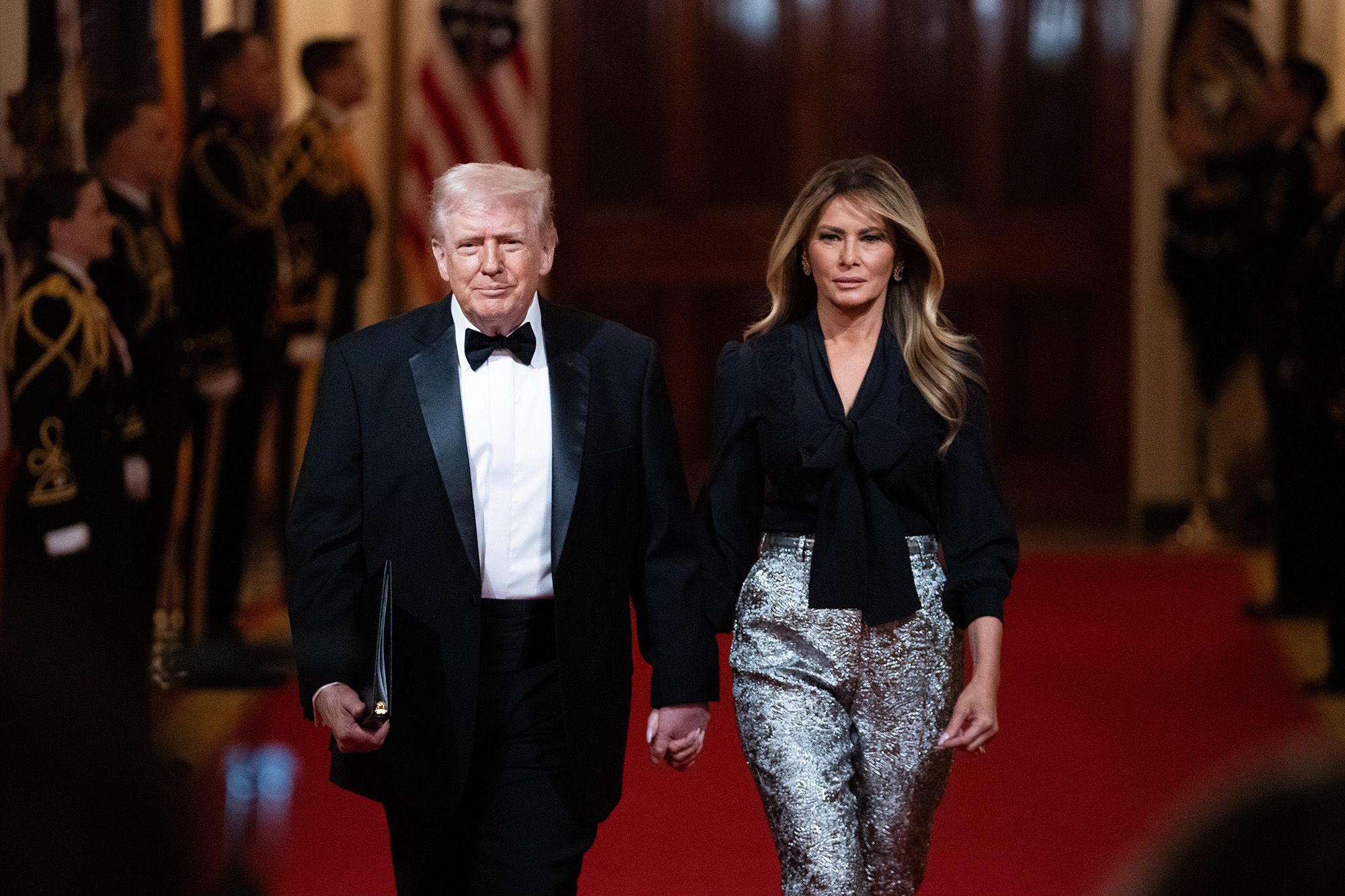 <i>Allison Robbert/AP via CNN Newsource</i><br/>President Donald Trump and first lady Melania Trump arrive at the National Governors Association dinner at the White House
