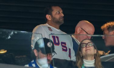 Vehicles drive past a charred bus the day after the Mexican army killed Jalisco New Generation Cartel leader Nemesio Oseguera Cervantes