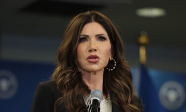 Secretary of Homeland Security Kristi Noem speaks during a news conference at Miami International Airport in Miami
