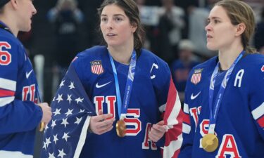 Team USA captain Hilary Knight (center) celebrates victory over Team Canada at the 2026 Winter Olympics.