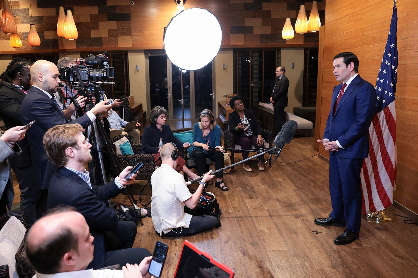<i>Jonathan Ernst/Pool/AFP/Getty Images via CNN Newsource</i><br/>US Secretary of State Marco Rubio speaks to reporters in a departure lounge before returning to Washington following meetings with Caribbean Community leaders