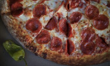 A Papa John's pepperoni pizza. The chain announced Thursday it was closing 300 restaurants.