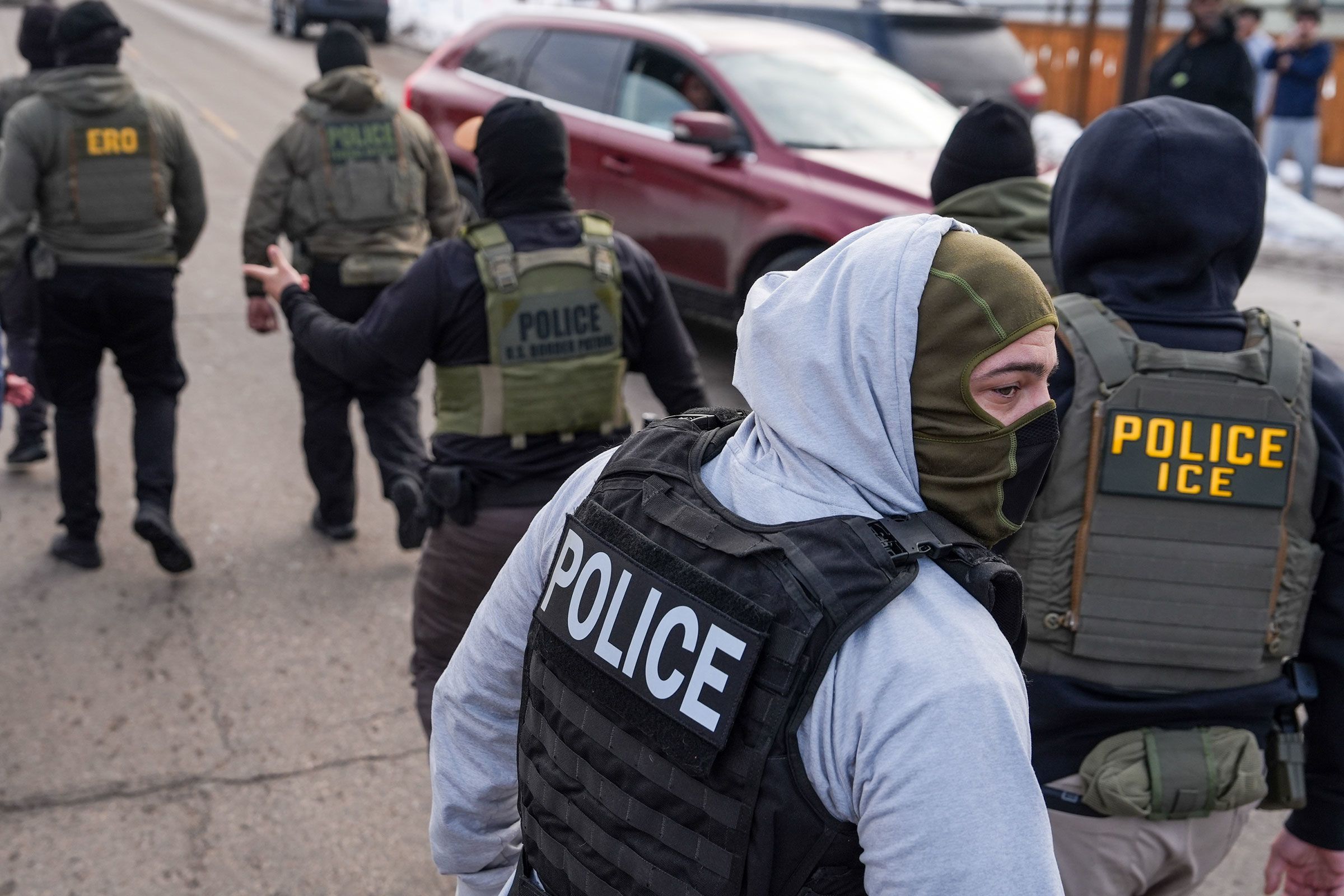 <i>Ryan Murphy/AP/File via CNN Newsource</i><br/>Federal agents conduct immigration enforcement operations earlier this month in Minneapolis.