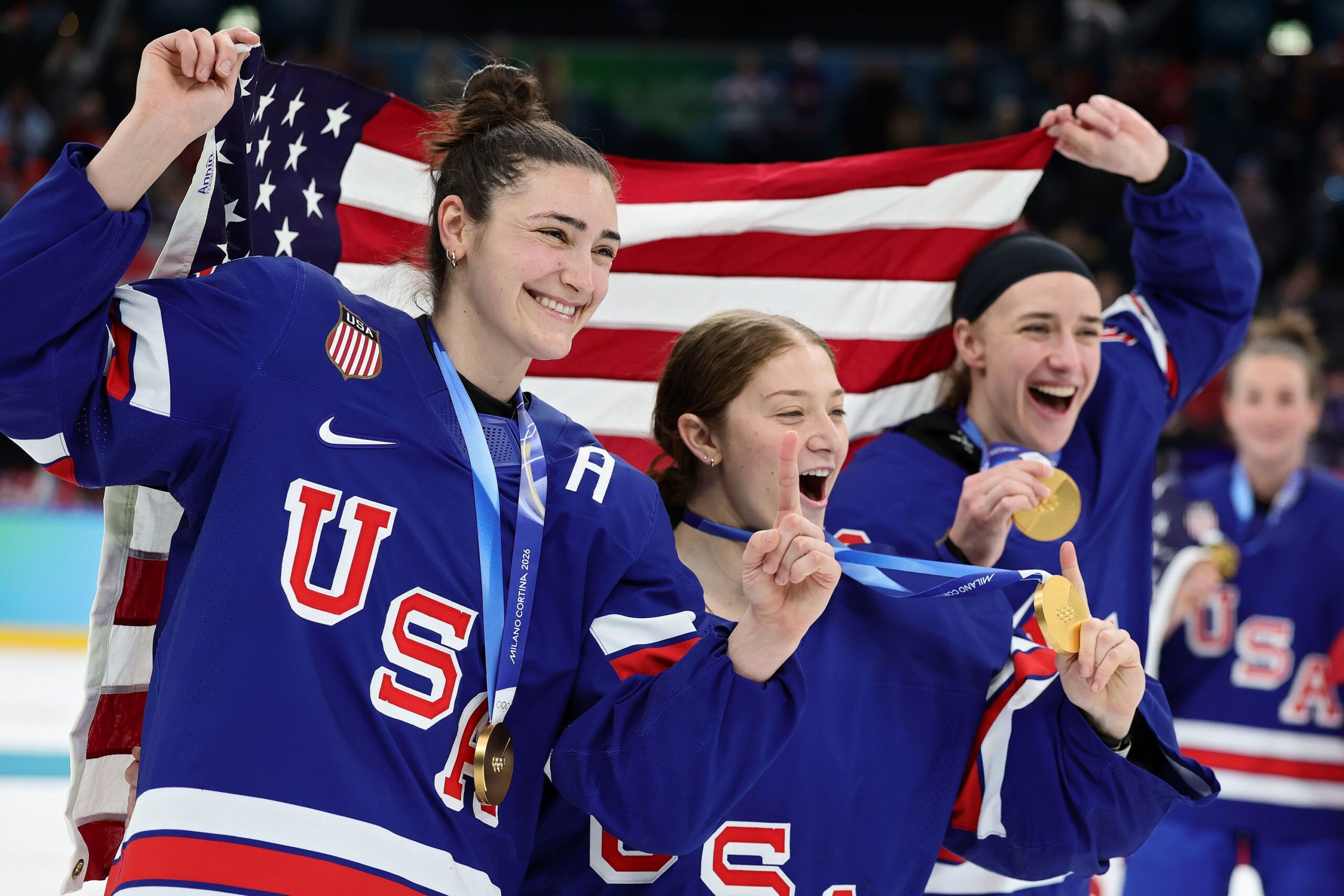 <i>Julien De Rosa/AFP/Getty Images via CNN Newsource</i><br/>US players celebrate after winning the women's gold medal in the hockey final.