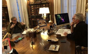 Jeffery Epstein and Steve Bannon pose in this handout image from the estate of late financier and convicted sex offender Jeffrey Epstein.