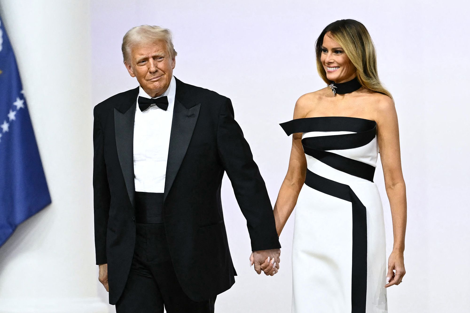 <i>Patrick T. Fallon/AFP/Getty Images via CNN Newsource</i><br/>Melania Trump enters an inaugural ball in 2025