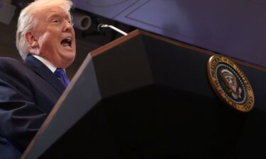 President Donald Trump speaks during a press briefing at the White House on Friday.