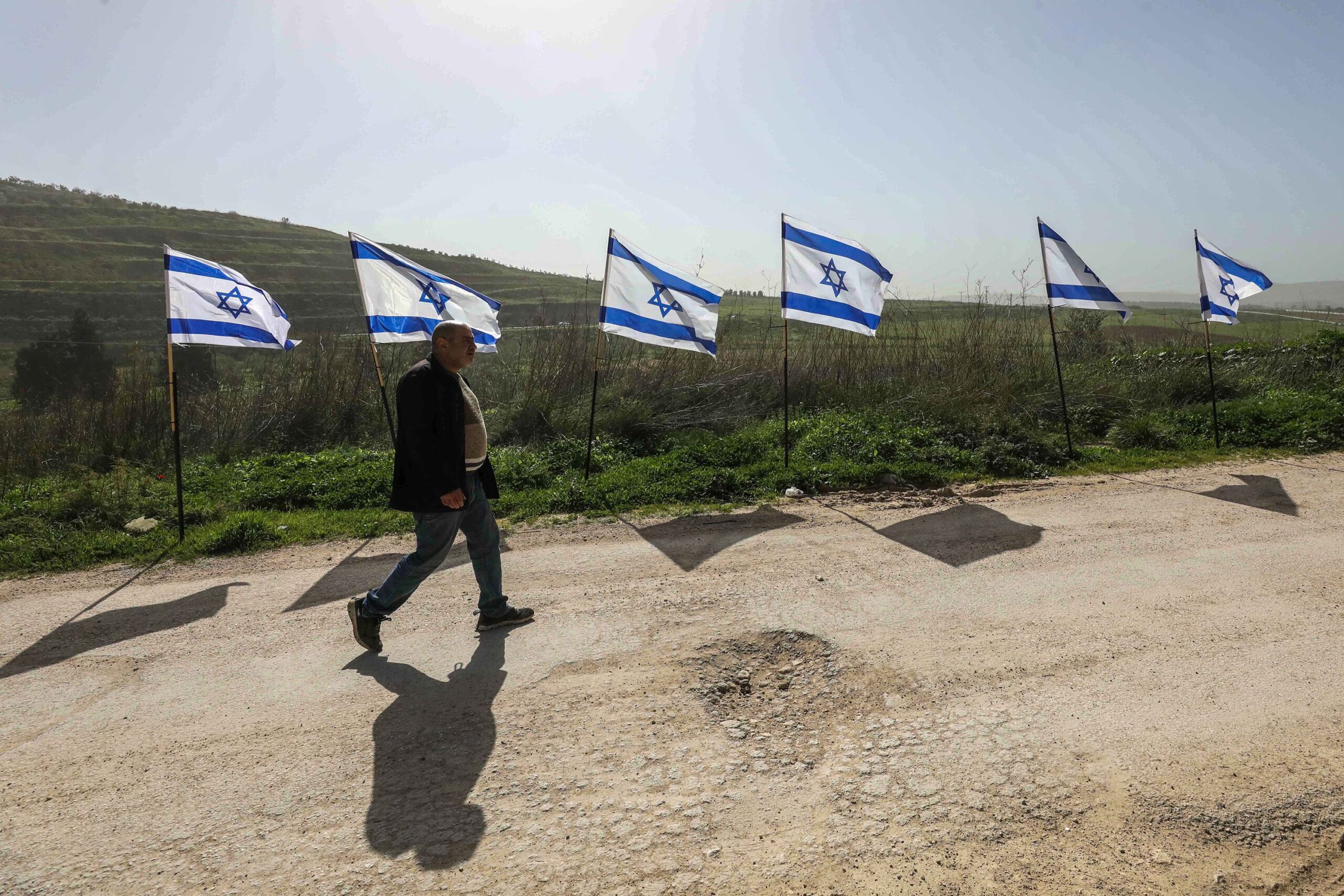 <i>Nedal Eshtayah/Anadolu/Getty Images via CNN Newsource</i><br/>Israeli flags are seen near Nablus