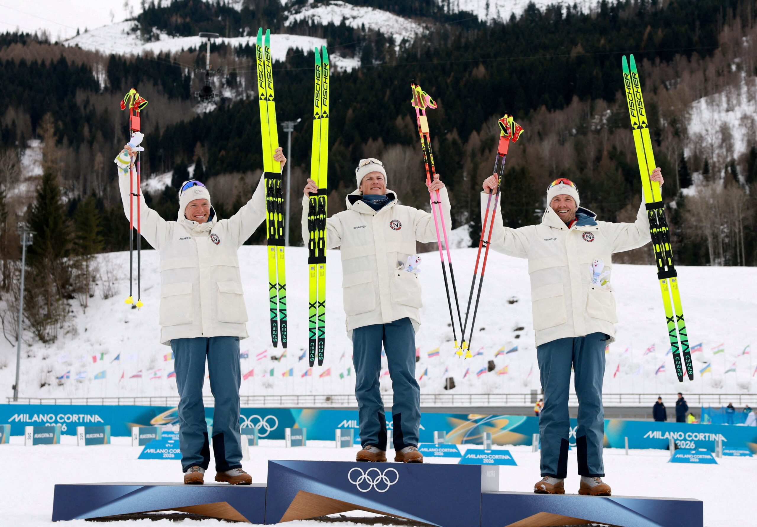 <i>Stephanie Lecocq/Reuters via CNN Newsource</i><br/>Gold medalist Johannes Hoesflot Klaebo of Norway celebrates on the podium after the men's 50km mass start classic alongside silver medalist Martin Loewstroem Nyenget of Norway and bronze medalist Emil Iversen of Norway