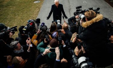 President Donald Trump speaks to reporters on the South Lawn of the White House on January 16.