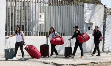 Passengers leave Guadalajara International Airport in Tlaquepaque