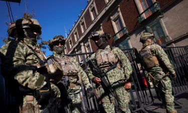 Military personnel patrol the Palacio Nacional in Mexico City following the killing of drug lord "El Mencho" in a military operation on Sunday.