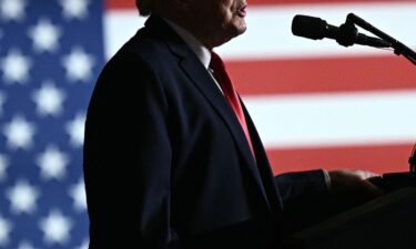 People walk past the US Supreme Court building in Washington