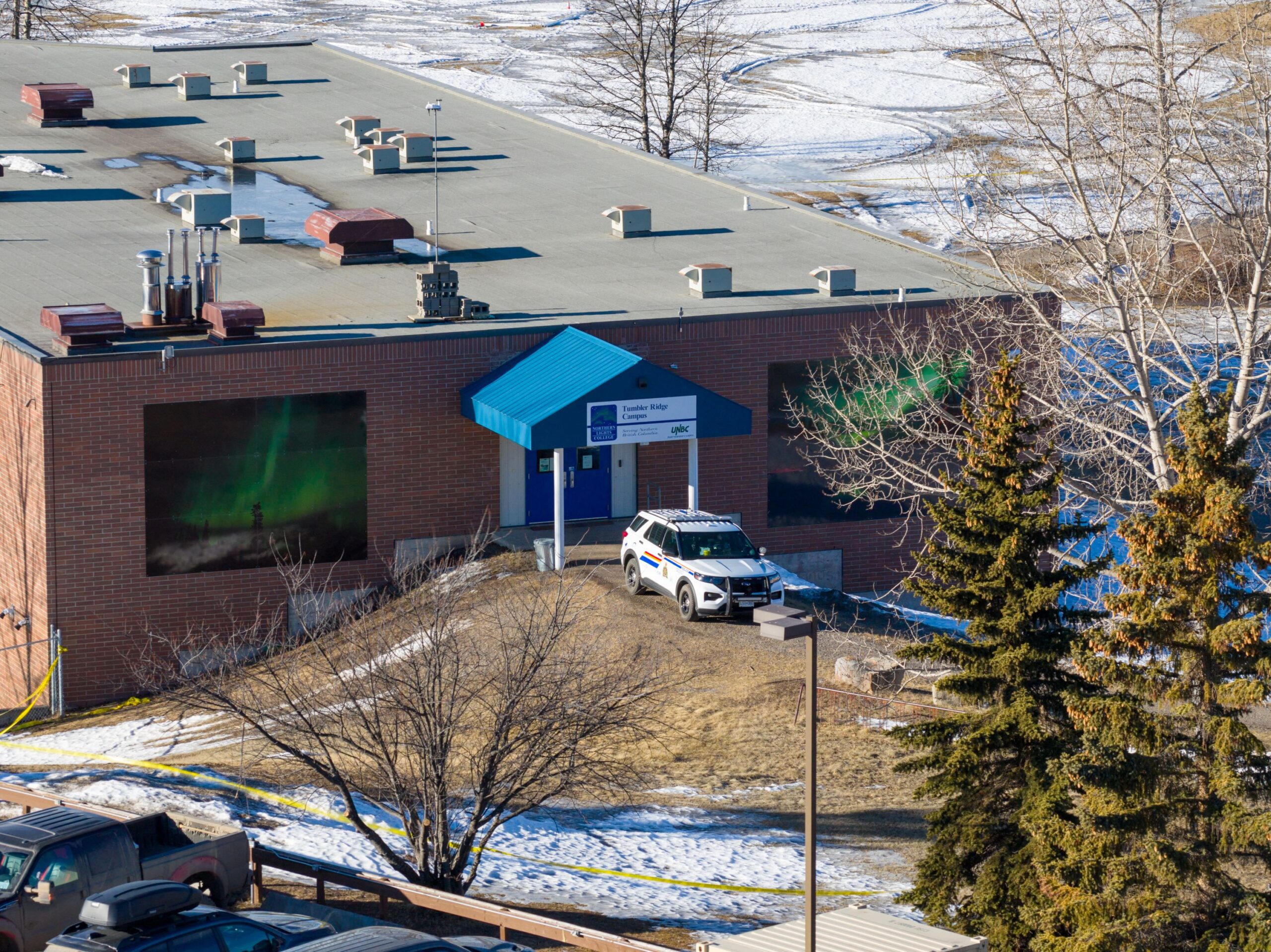 <i>Eagle Vision Agency/AFP/Getty Images via CNN Newsource</i><br/>A police vehicle is parked in front of Tumbler Ridge Secondary School where a mass shooting took place on Tuesday.