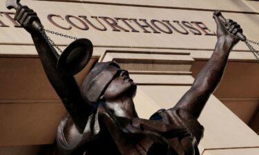 A statue of blindfolded Justice