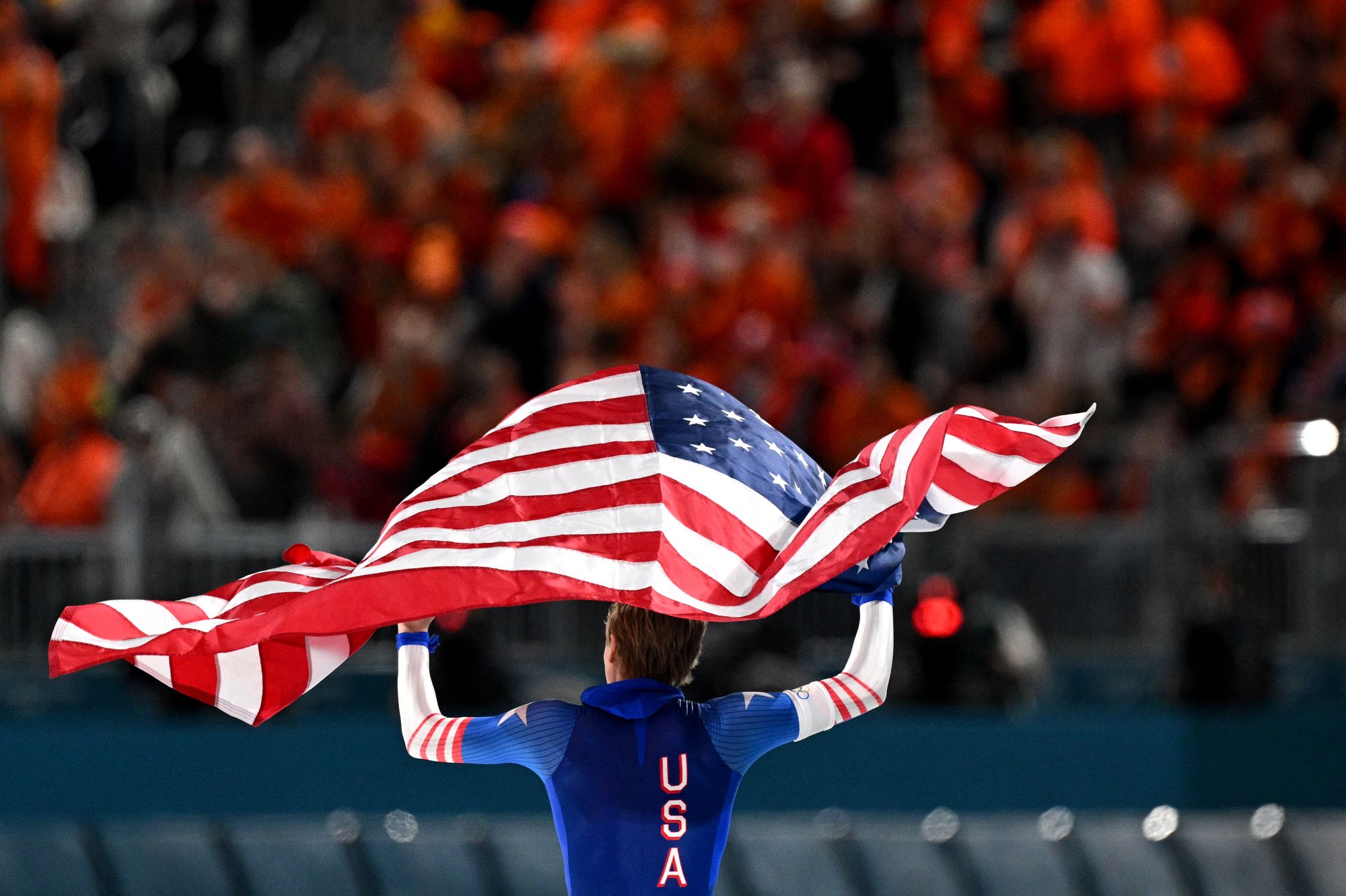 <i>Dean Mouhtaropoulos/Getty Images via CNN Newsource</i><br/>Jordan Stolz celebrates after winning gold in the men's 500m.