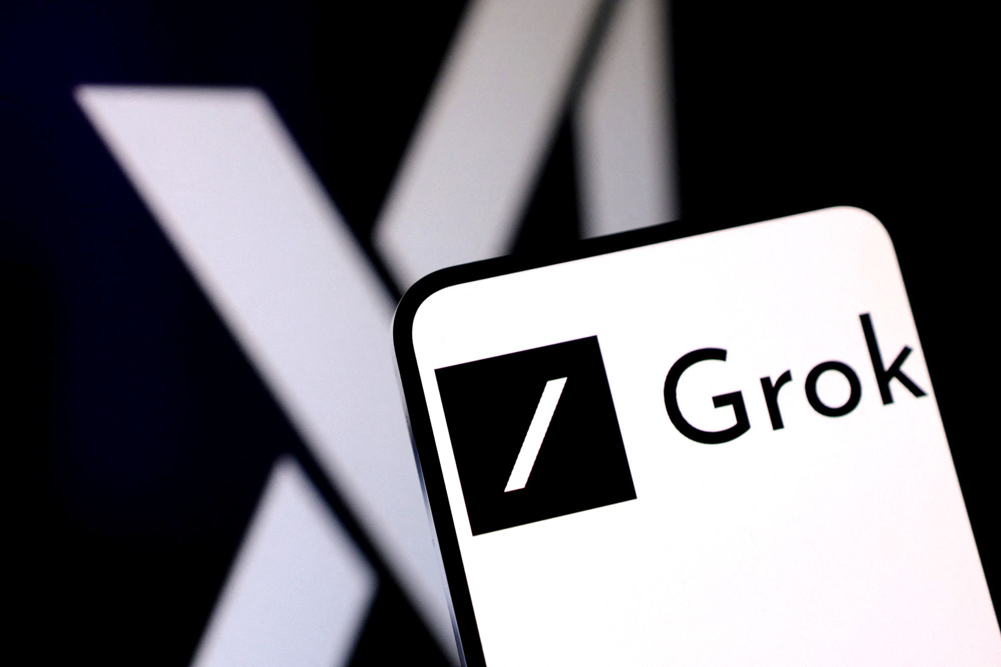 <i>Dado Ruvic/Reuters via CNN Newsource</i><br/>xAI and Grok logos are seen in this illustration taken on February 16