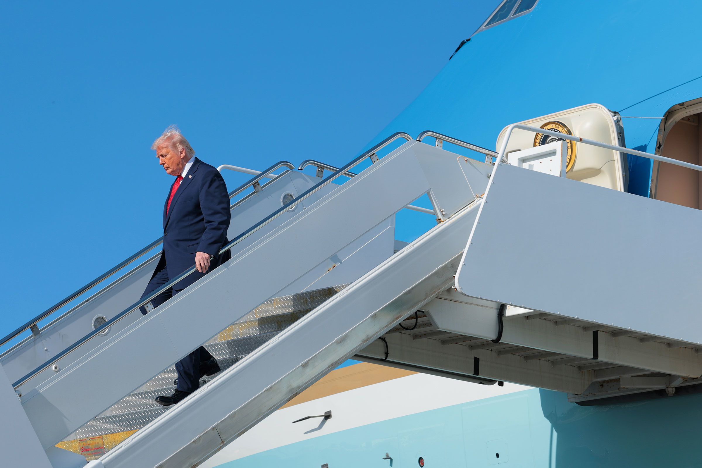 <i>Anna Moneymaker/Getty Images/File via CNN Newsource</i><br/>President Donald Trump departs Air Force One after arriving at Palm Beach International Airport in West Palm Beach