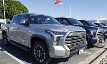 A lineup of Toyota trucks on display at a dealership in Round Rock
