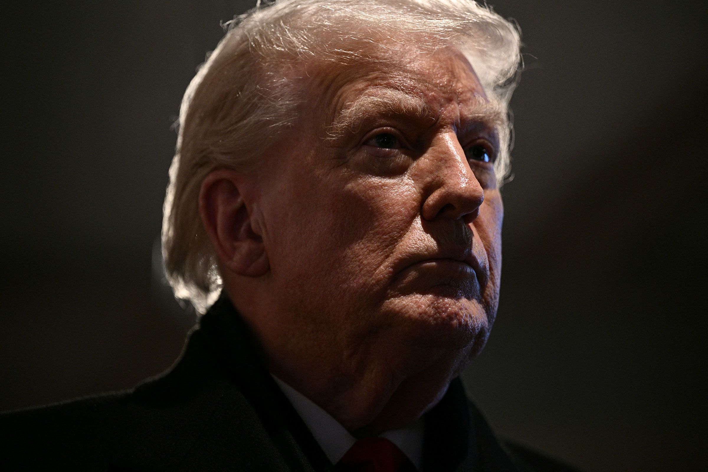 <i>Brendan Smialowski/AFP/Getty Images via CNN Newsource</i><br/>US President Donald Trump speaks during a stop at the Machine Shed restaurant in Urbandale