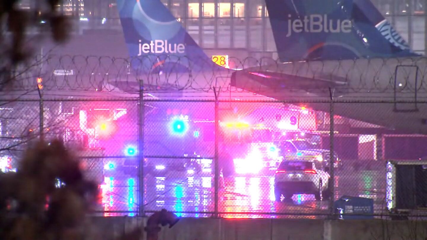 <i>WABC via CNN Newsource</i><br/>Emergency responders surround a JetBlue plane at Newark Liberty International Airport on February 18.