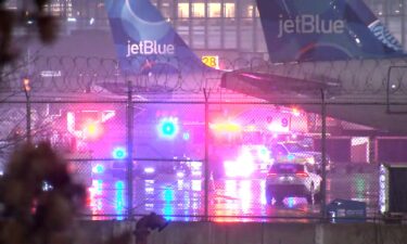 Emergency responders surround a JetBlue plane at Newark Liberty International Airport on February 18.