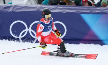 Loic Meillard completed an Olympic "hat trick" by winning his third medal of the 2026 Winter Games. He captured gold in the men's slalom in Bormio