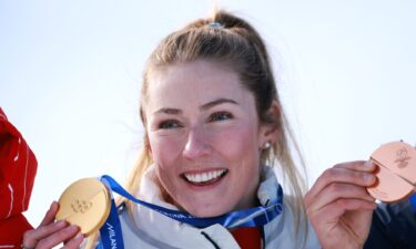 Mikaela Shiffrin receives her gold medal.