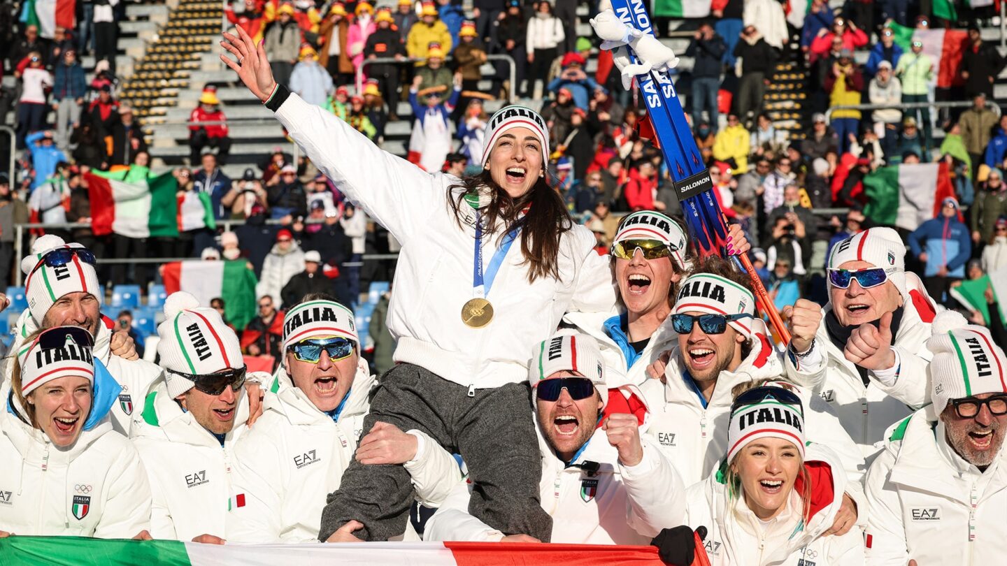 Lisa Vittozzi celebrates with Team Italy.