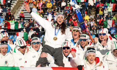 Lisa Vittozzi celebrates with Team Italy.