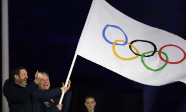 The Olympic flag handoff.