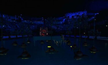 The Olympic flame is extinguished.