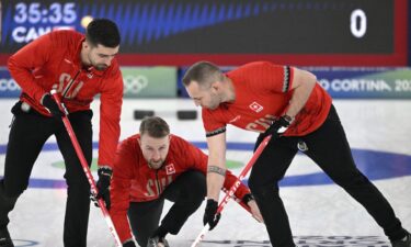 Switzerland curlers come down the ice