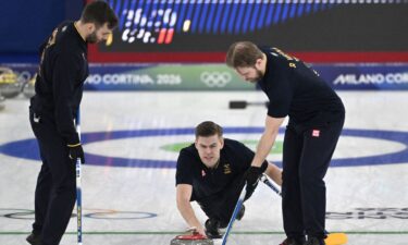 Swedish curlers come down the ice