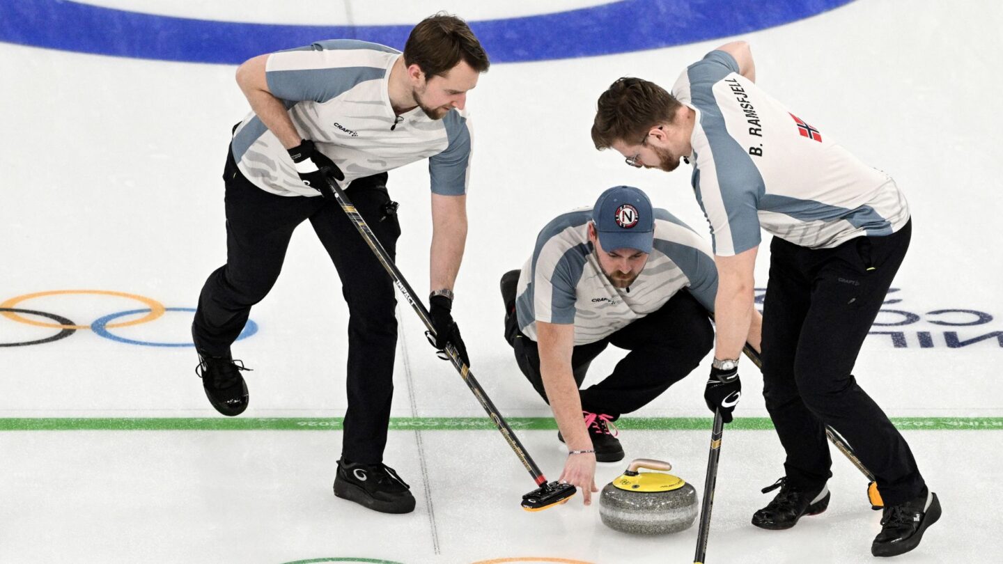 Italian sweepers come down the ice