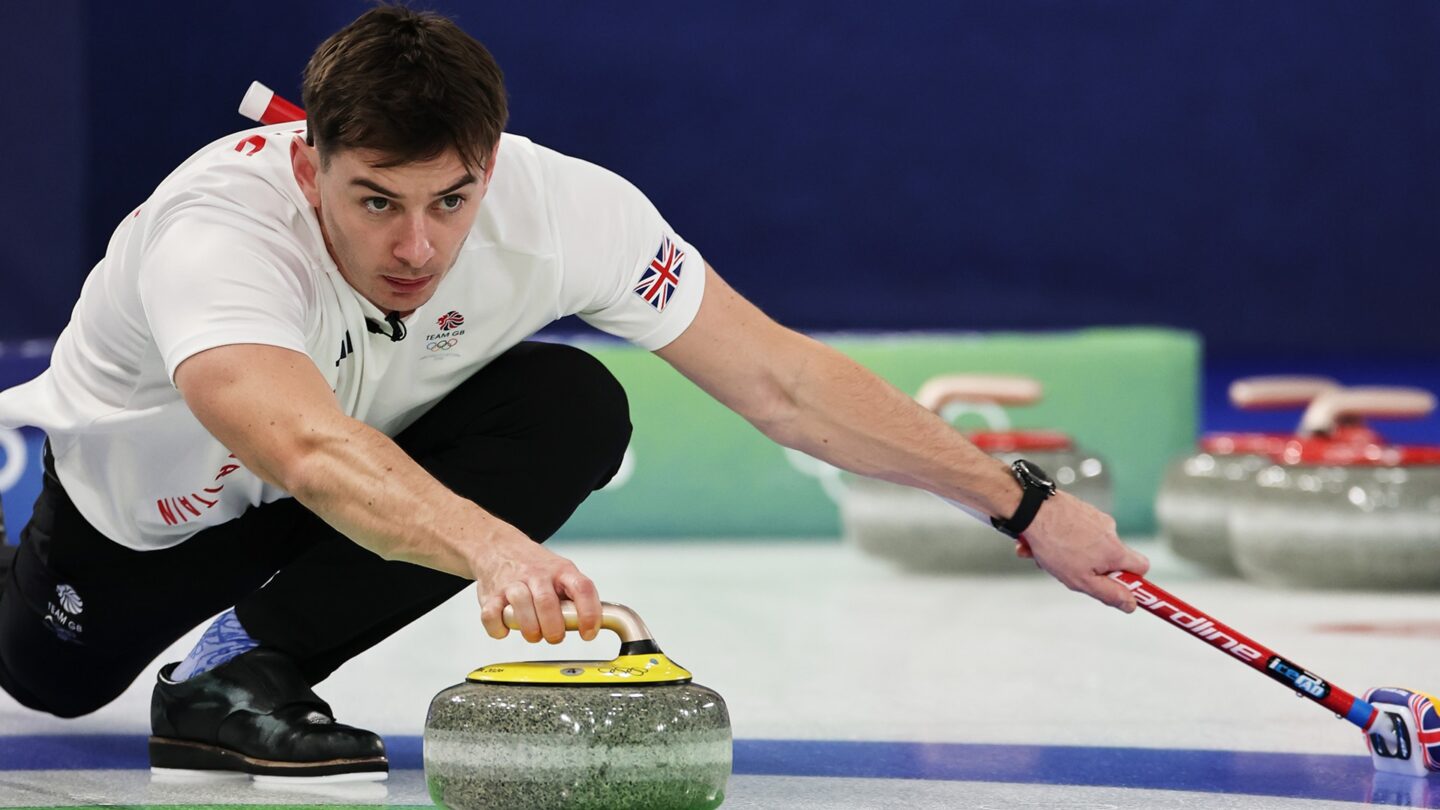 <i>NBC Olympics</i><br/>Great Britain curler prepares to throw