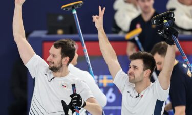 Czechia curlers wave to crowd