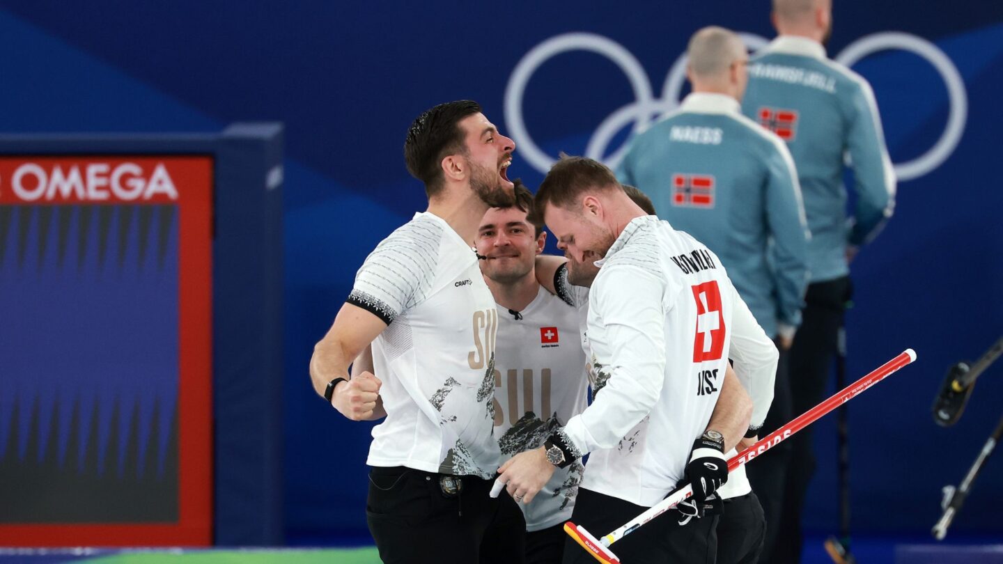 <i>NBC Olympics</i><br/>Switzerland players hug to celebrate win