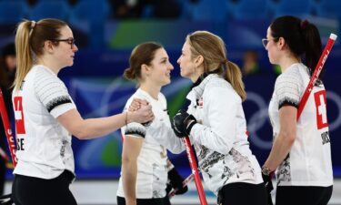 Switzerland's curlers celebrate win