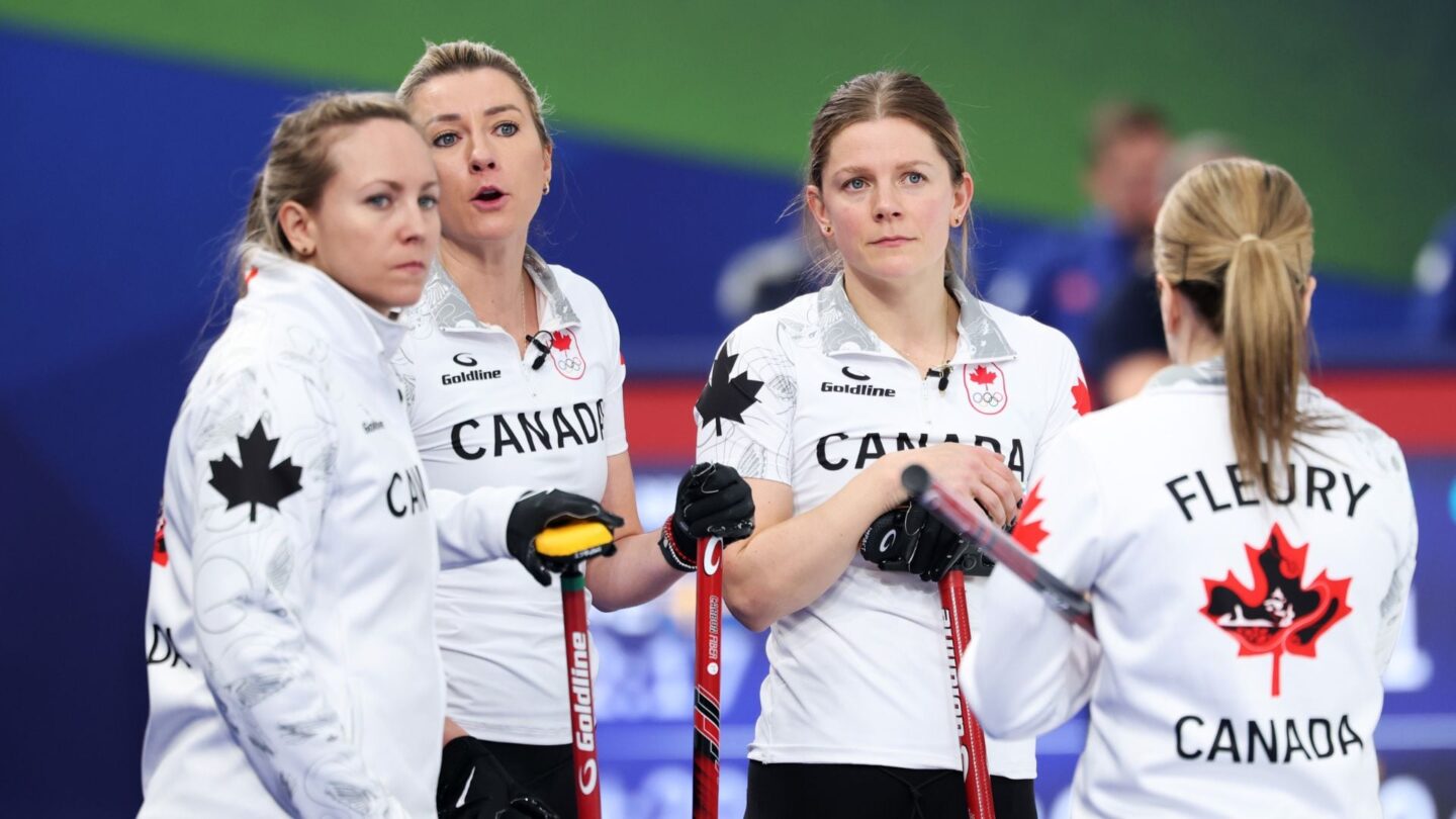 <i>NBC Olympics</i><br/>Canada curlers hold their brooms