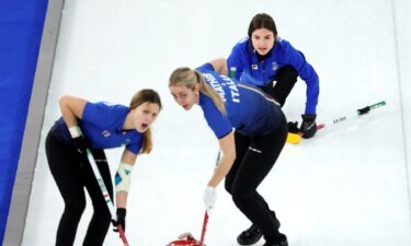 Italy curlers come down the ice