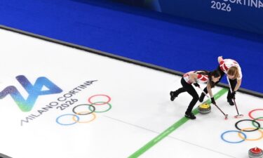 Denmark curlers come down the ice